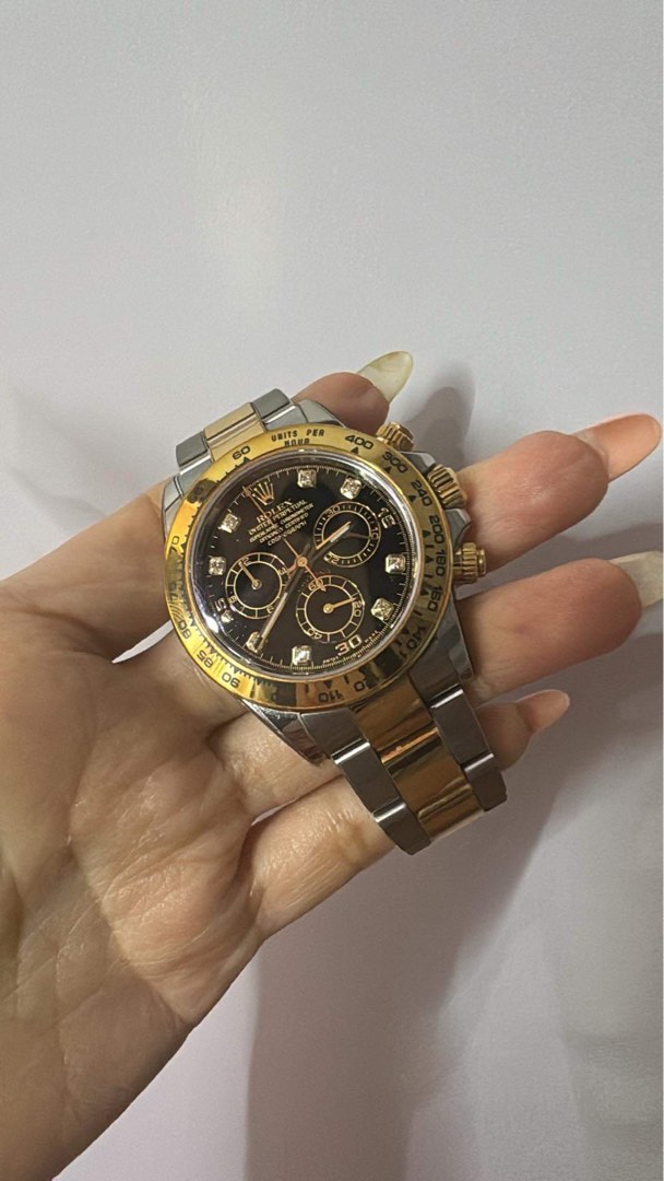 Rolex half 2024 gold daytona