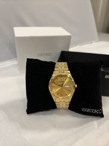 Seiko Men s Essential Champagne Dial Watch SUR434 MSRP 215