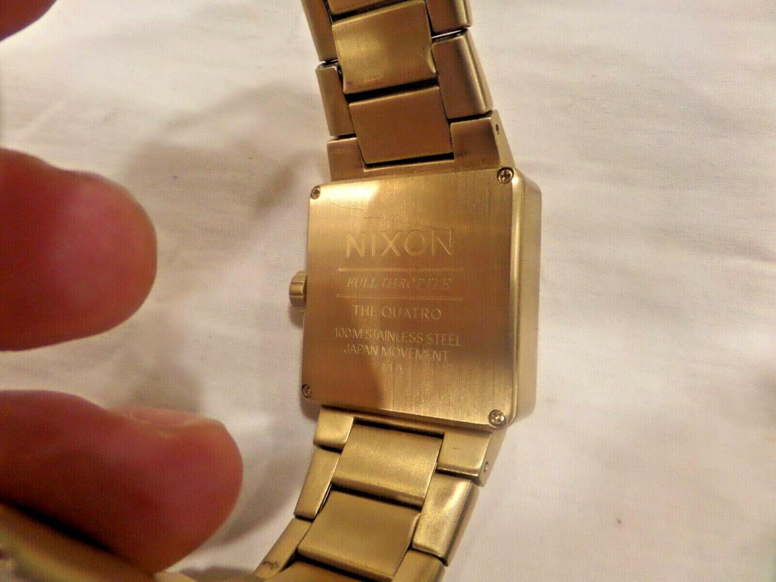 Nixon quatro cheap gold