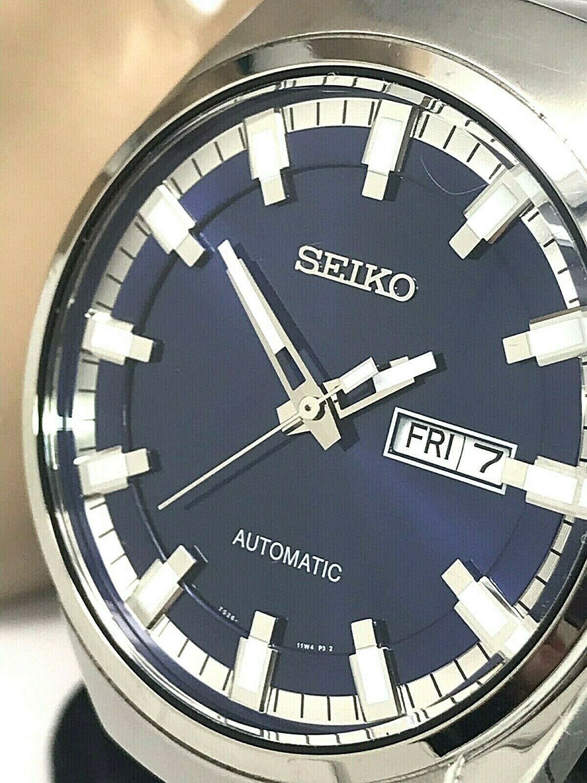 Seiko Men s Automatic SNKN41 Watch S. Steel Day Date Blue 21J