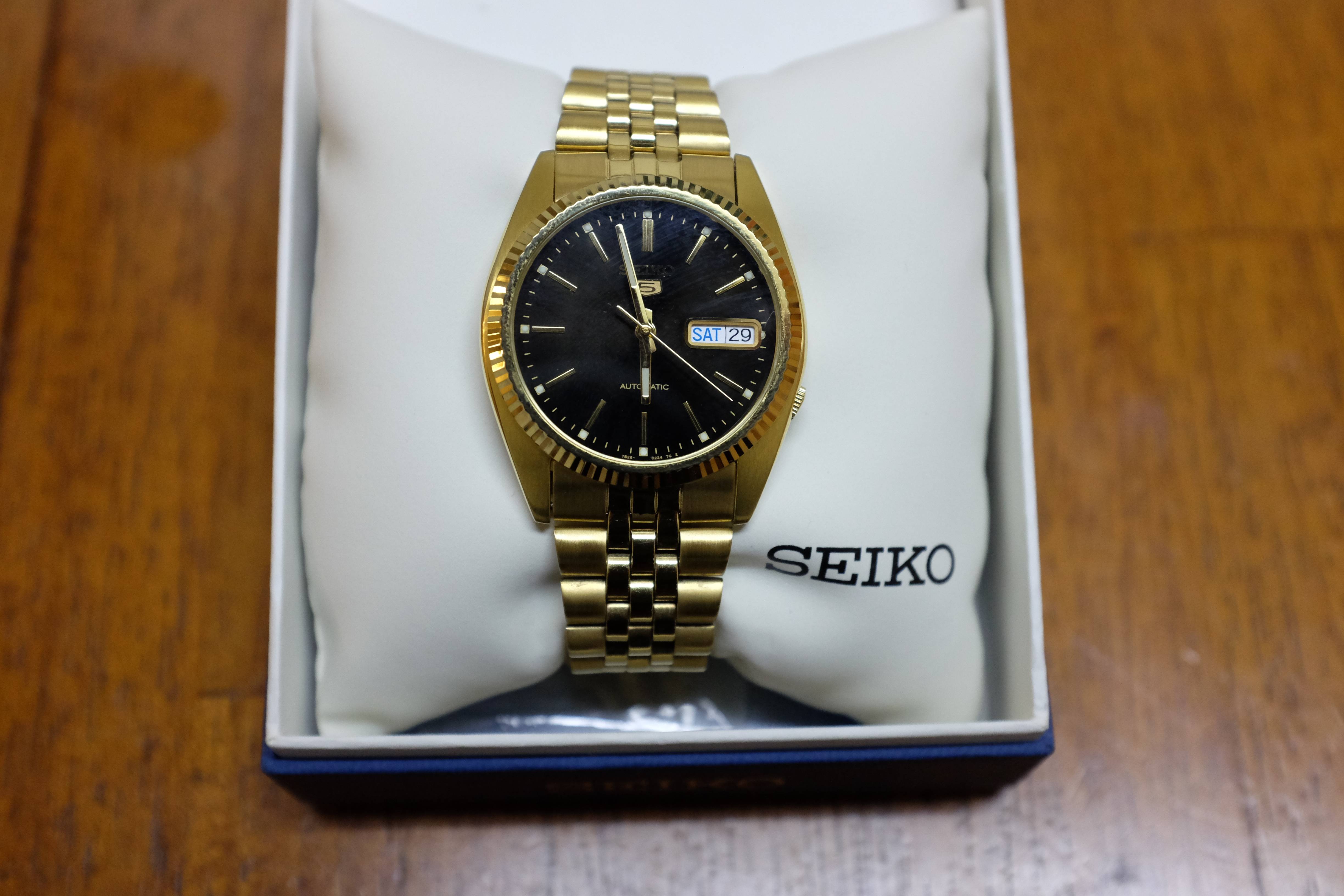 seiko gold black dial