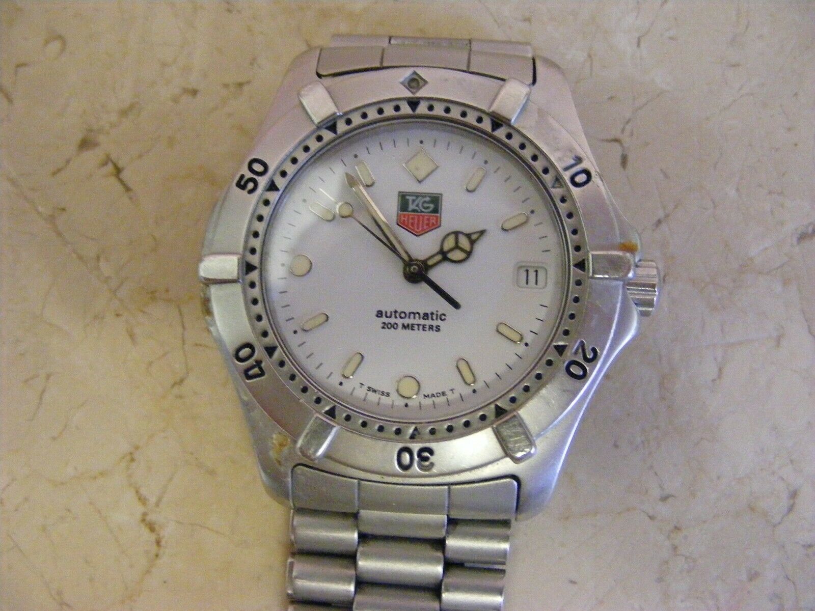 Tag Heuer WE2111 Automatic with box and papers WatchCharts