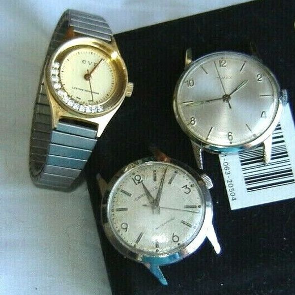 3 vintage wind up watches1 ladies CVP2 mensTimex and CaravelleALL
