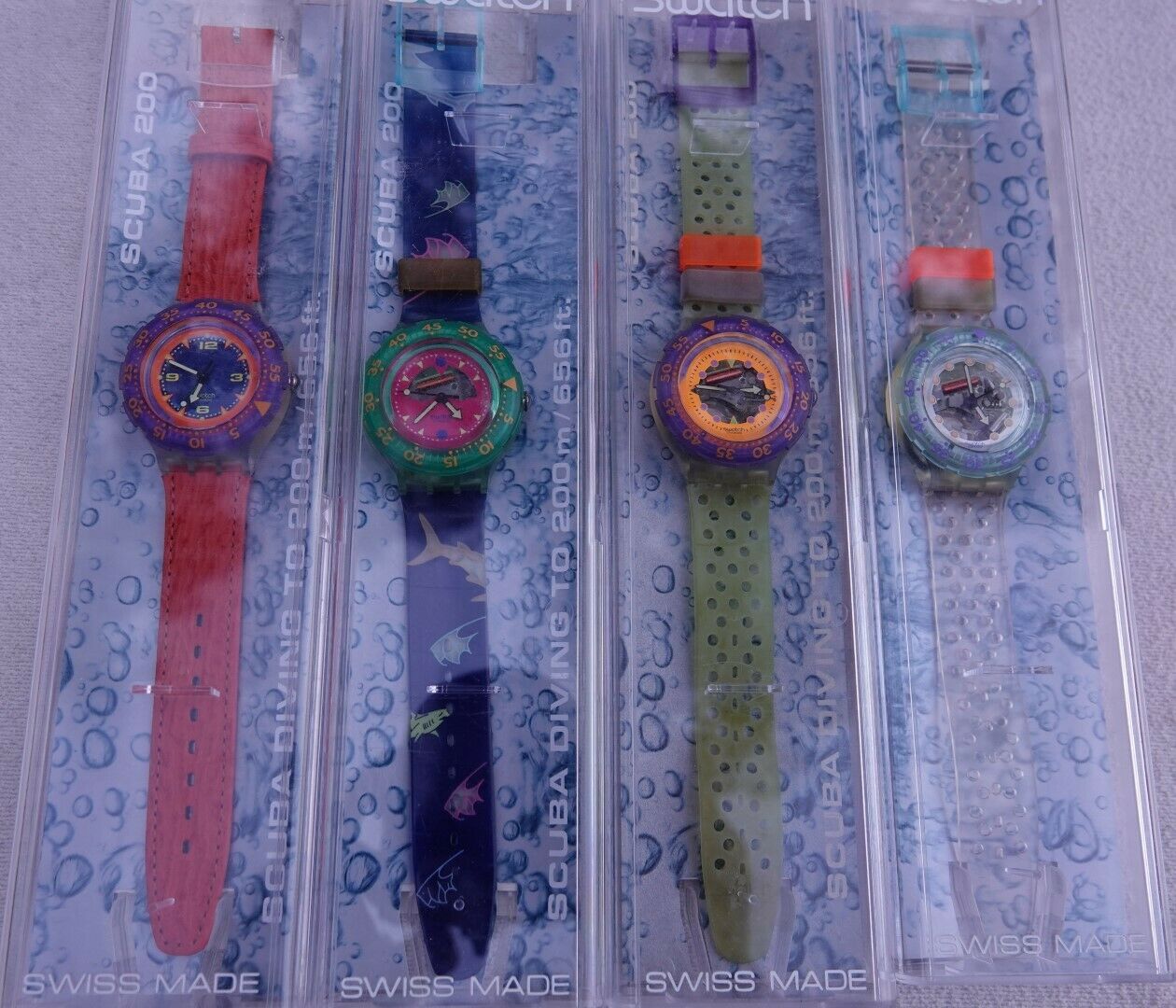 four Swatch Scuba 200 new unworn Red Island Happy Fish