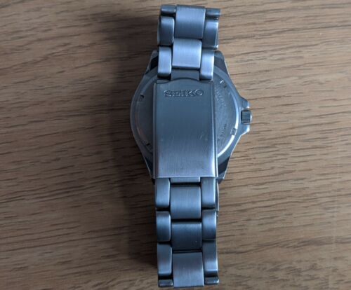 Men's SEIKO TITANIUM Watch - 100 M - V732-0P30 | WatchCharts