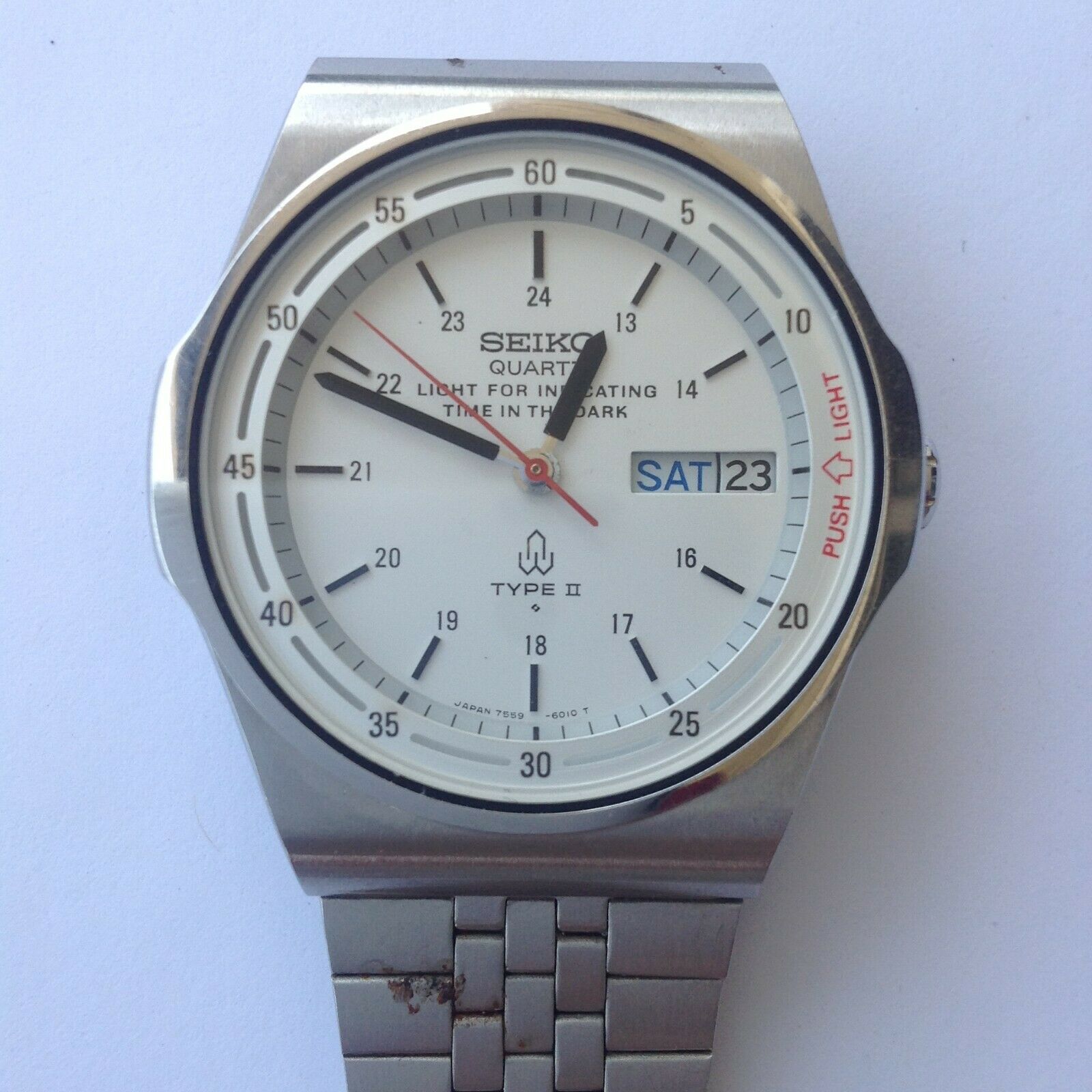 Seiko 7559-6010 watch, with light bulb, white dial, 37 mm | WatchCharts  Marketplace