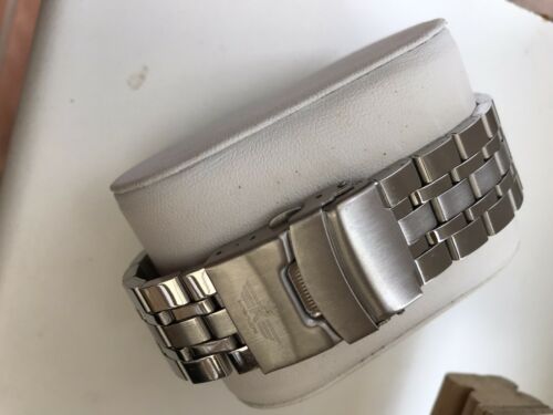 Seiko 3 ATM Waterproof QUARTZ Silver Strap Black Face