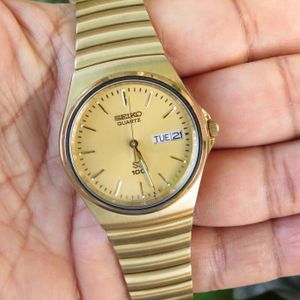 Vintage SQ 100 Quartz Watch 8123-7059 Unique Bracelet Gold Toned | WatchCharts