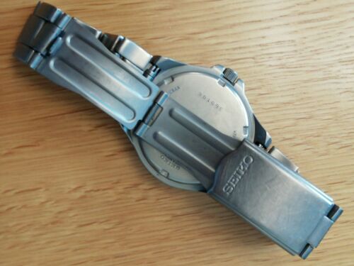 Seiko V732-0P30 Titanium Watch 100M Water Resist