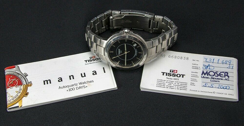 Tissot Powermatic Autoquartz. 1853 P881 981 Used. NEEDS NEW