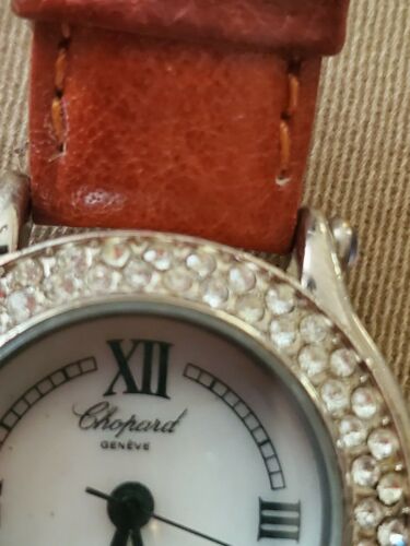 Chopard ladies watch with 7 diamonds. Argent plaque or G 20M