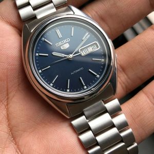 Seiko 5 SNXF03 Sunburst Blue dial Oyster Case Full Mint Working Fine  Vintage OEM | WatchCharts