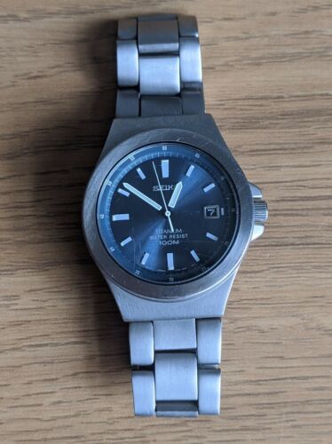 Men's SEIKO TITANIUM Watch - 100 M - V732-0P30 | WatchCharts