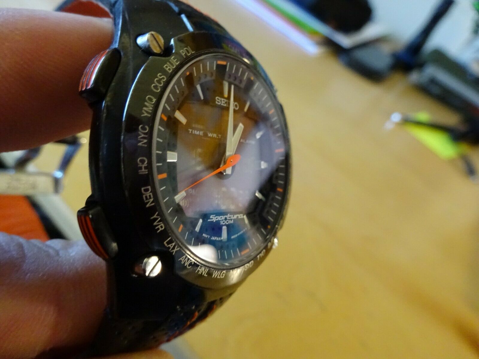 Seiko Sportura H023-00E0 World Timer Watch (Black and Orange 