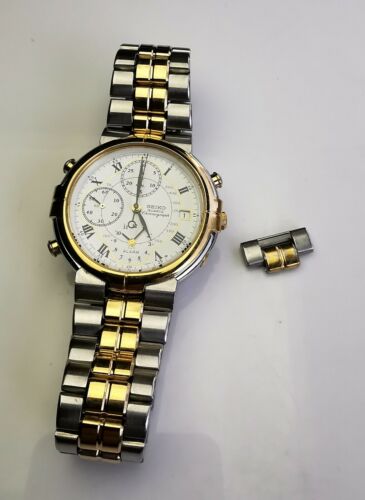 Seiko Quartz Chronograph 7T32 7A00 Armbanduhr Herren Stahl Gold