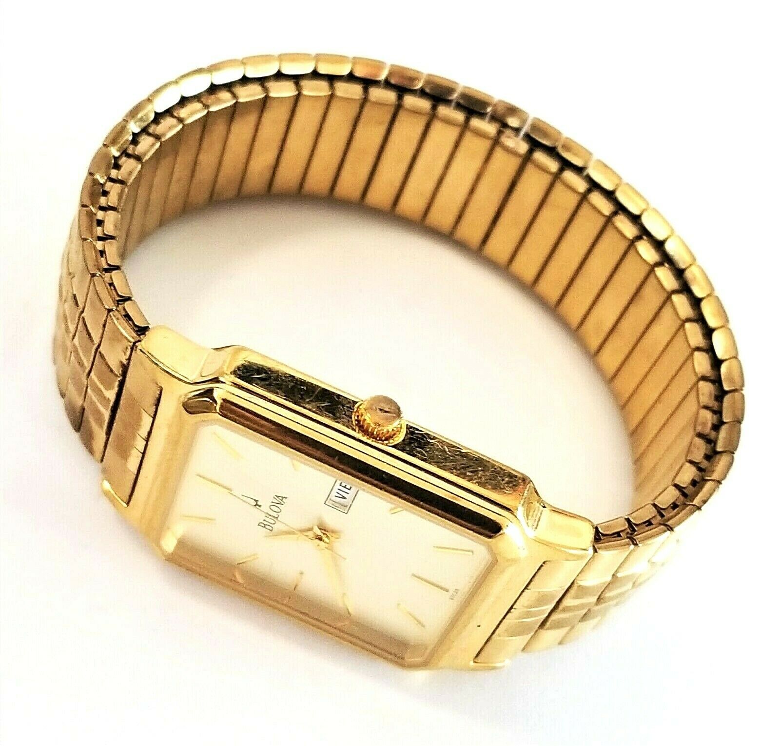 Bulova A3 Gold Tone Tank Watch With Date Indicator and Stretch Band WatchCharts Marketplace