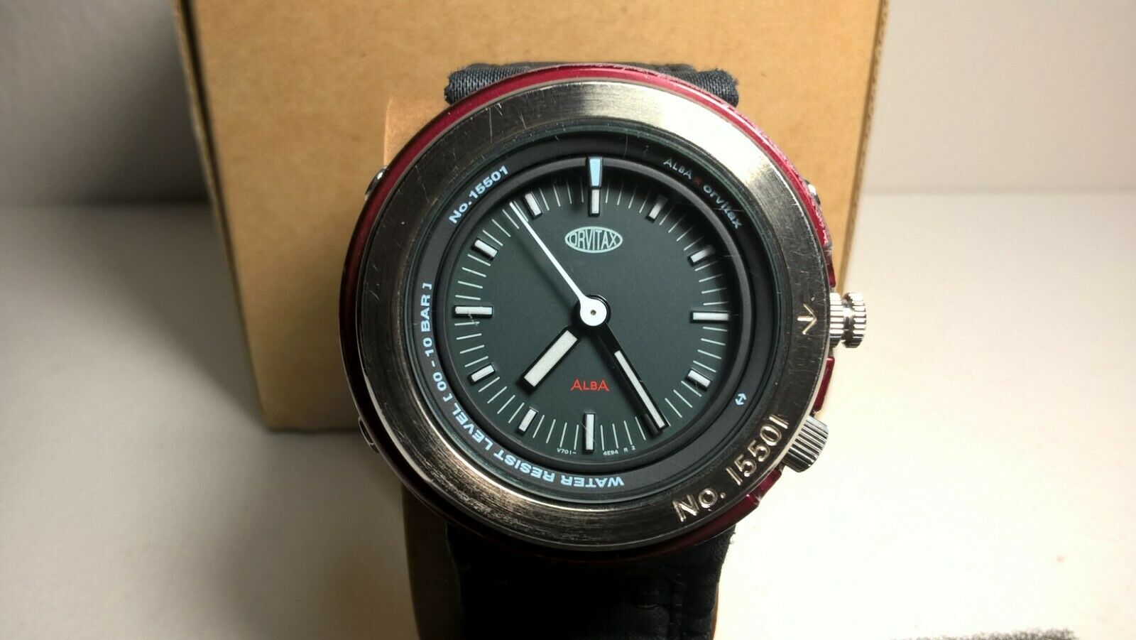 Obscure Shrouded Seiko Alba Orvitax V701-2K40 with Original Strap and Rare  Box | WatchCharts Marketplace