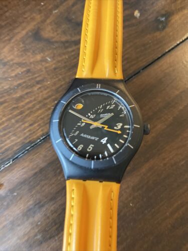 SWATCH AUTOQUARTZ - Black & Orange STB403 APPROACHING DIAL KINETIC