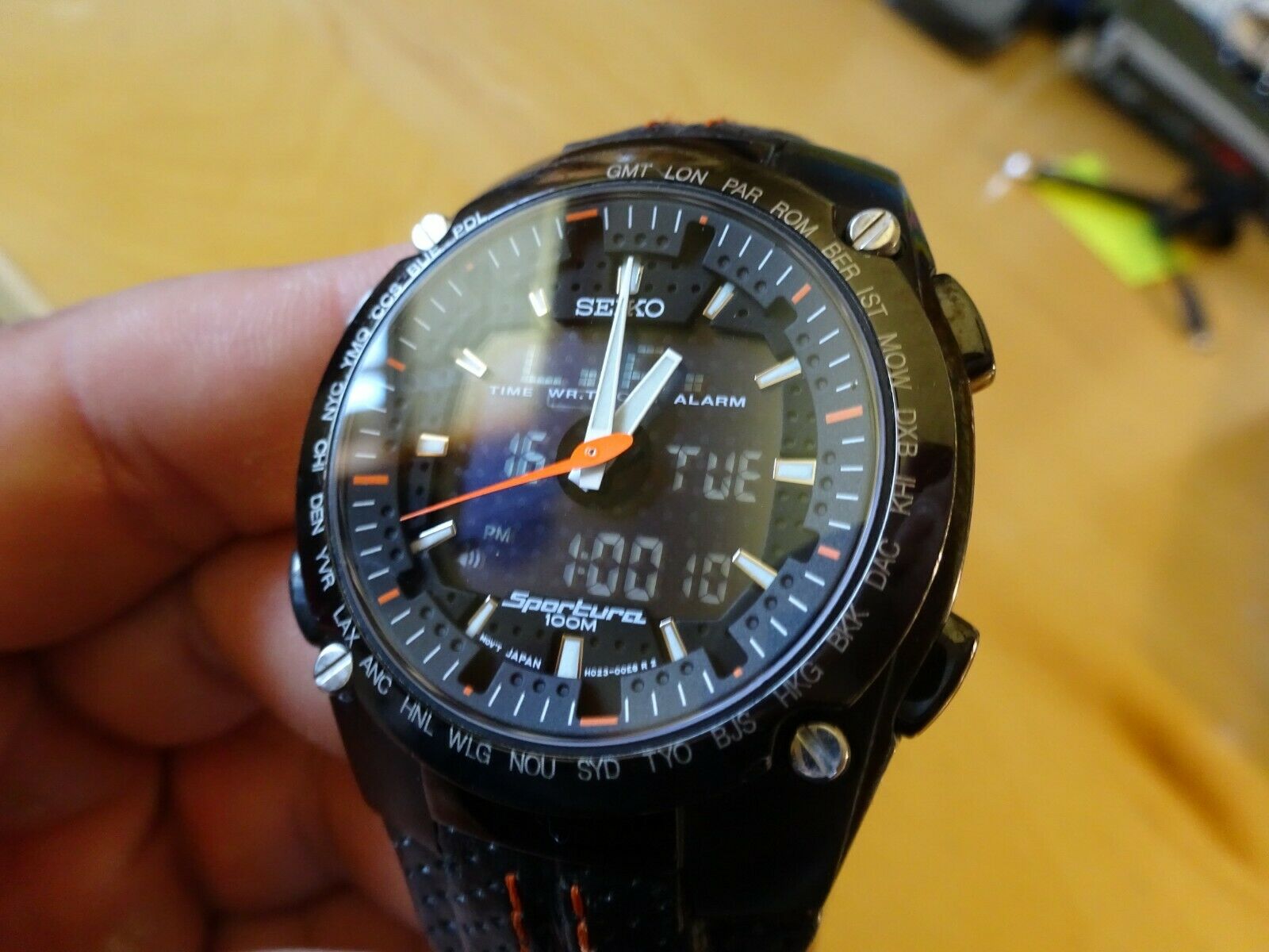 Seiko Sportura H023-00E0 World Timer Watch (Black and Orange 