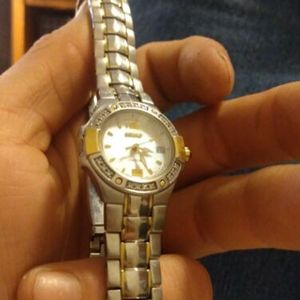 Seiko 7N82-0CG0 Women's Coutura Watch Diamond Bezel sapphire crystal  SN-783747 | WatchCharts