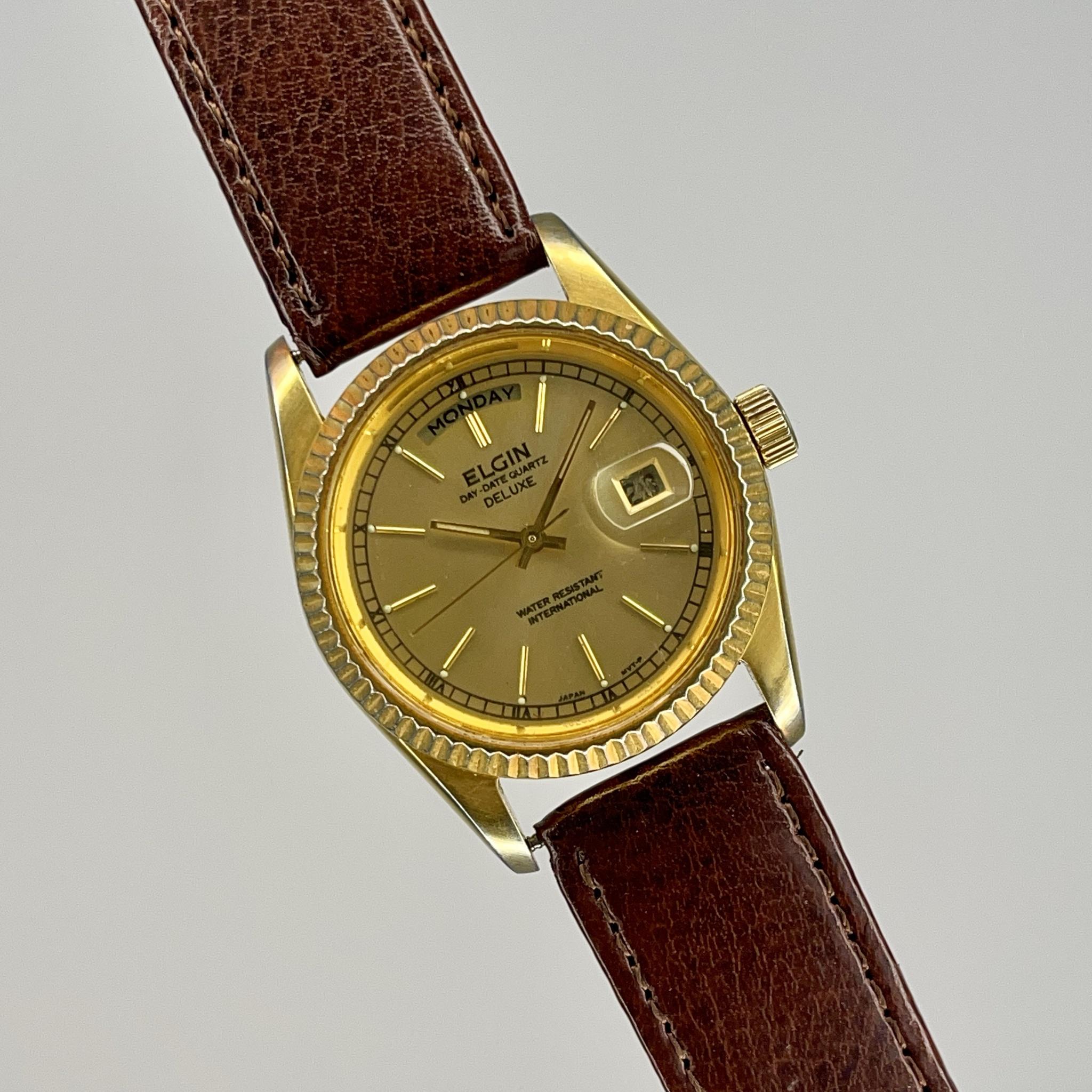 Elgin automatic deluxe sale