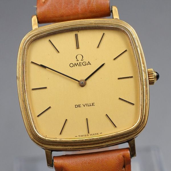 1968 Omega De Ville Unusual solid 18k Gold Tonneau Wristwatch Model 111.084 with sunbeam dial