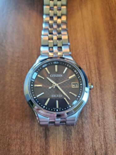 Citizen Exceed AS7040-59E Titanium Date H111-T013627 Eco-Drive