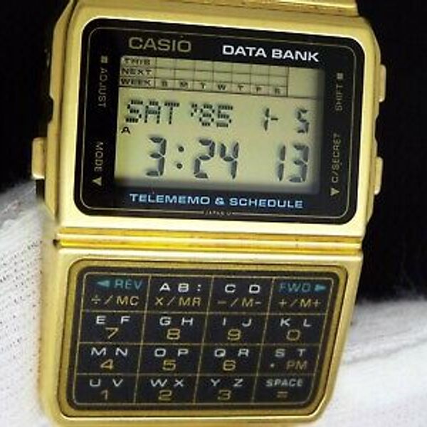 CASIO VINTAGE DIGITAL WATCH DBC-610 GOLD 676 TELEMEMO DATABANK