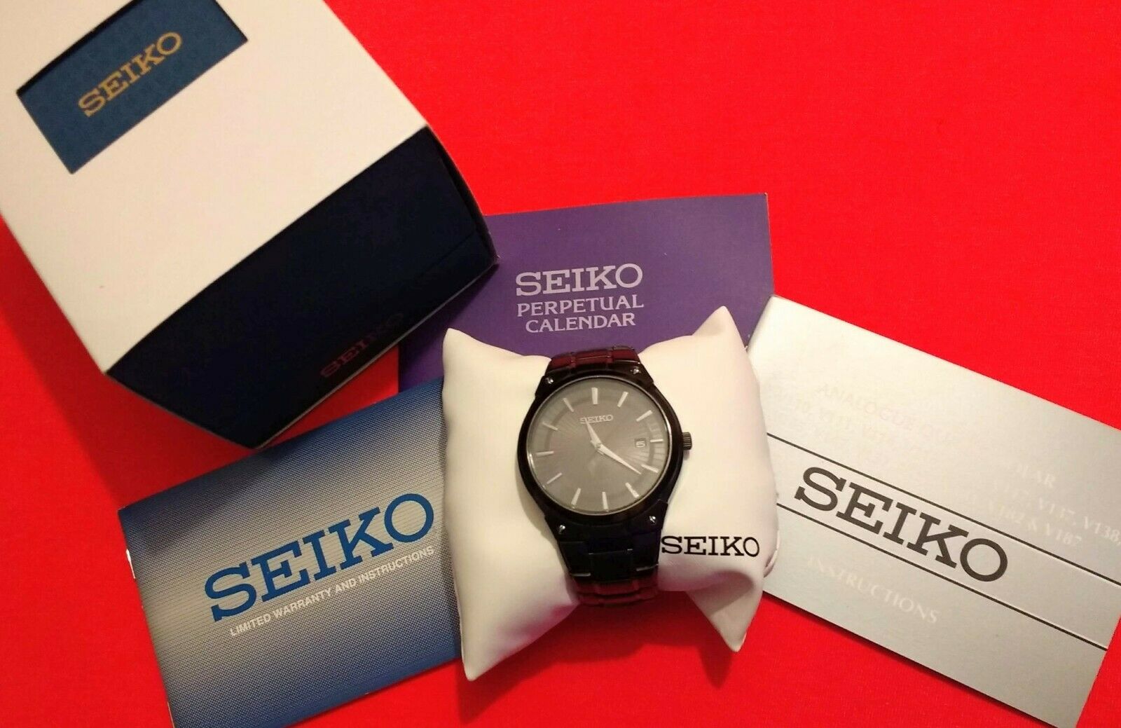 Seiko men's black ion finish solar deals calendar dress watch