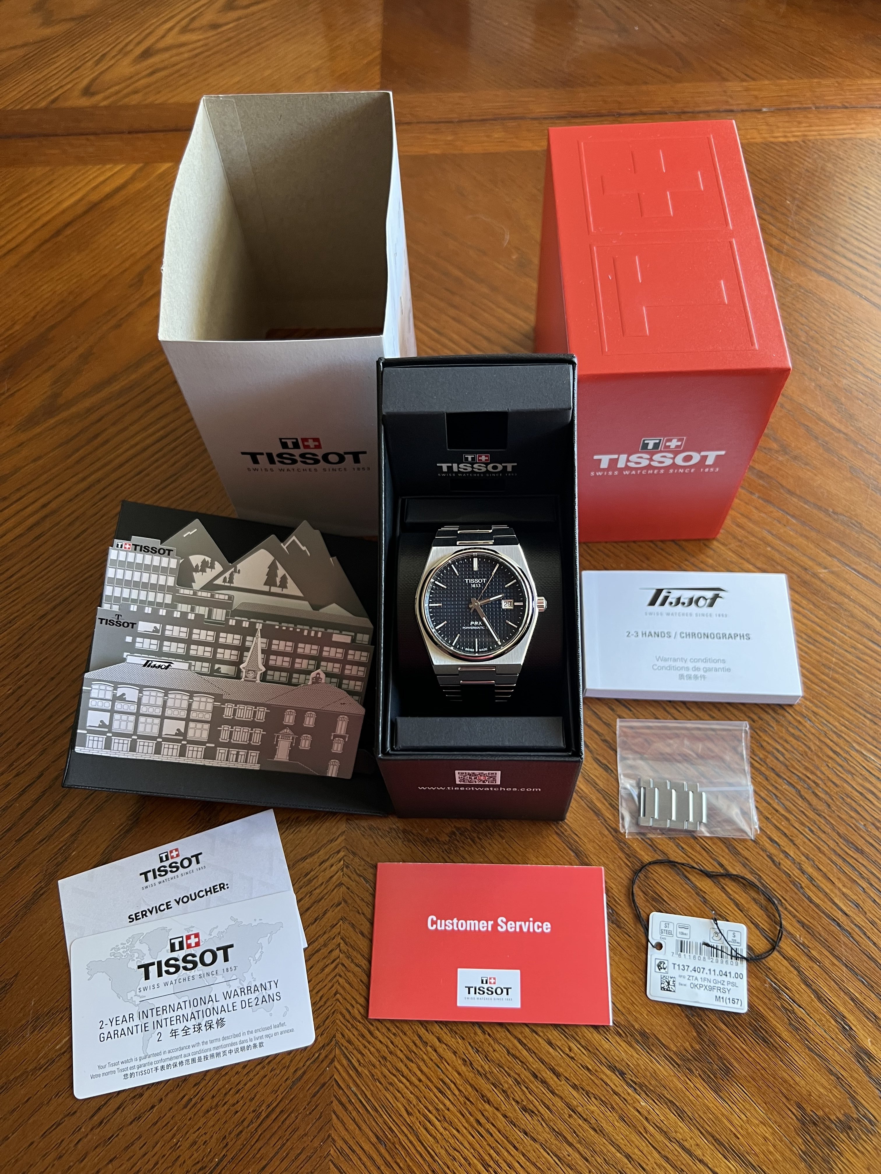 500 USD Tissot PRX Powermatic 80 blue dial w box warranty card