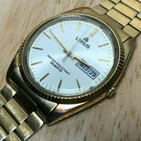 Vintage Lorus Men Gold Tone Fluted Bezel Quartz Watch HoursDay Date