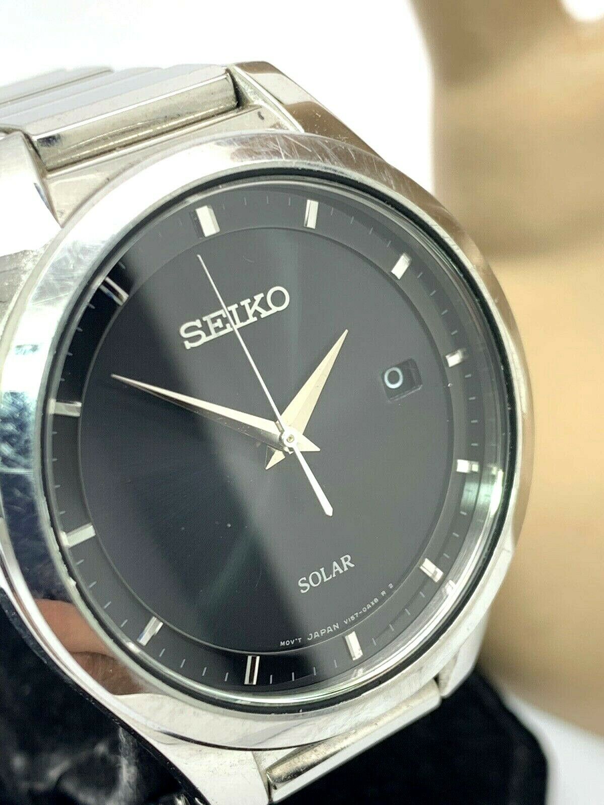 Seiko Solar Black Dial Date Silver Tone Stainless Steel Men's