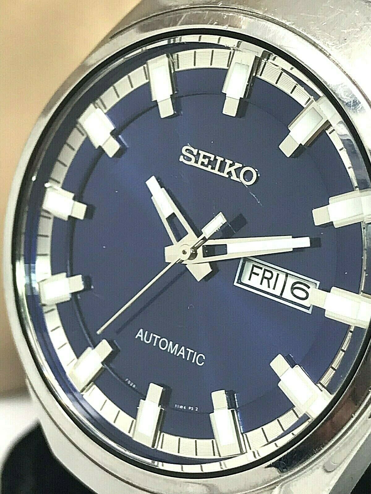 Seiko Men's Automatic SNKN41 Watch S. Steel Day Date Blue 21J 7S26-04G0  USED | WatchCharts