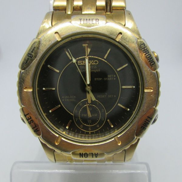 SEIKO 8V20-7000 ALARM CHRONOGRAPH BEZEL OPERATED GOLDPLATED QUARTZ