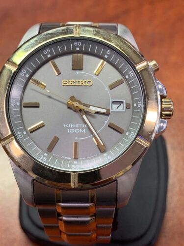 Seiko Kinetic Mens Watch 100M Model 5M62 0DA0 Gold Gray Stainless