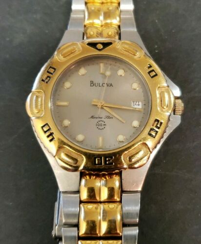 bulova marine star silver and gold