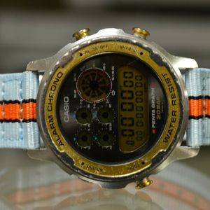 CASIO DW-7200 PENTA GRAPH GREY/GOLD DIGITAL WATCH VINTAGE DGW TGW 