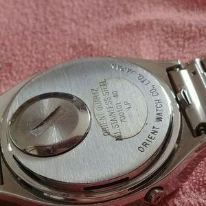 Orient lcd music alarm melody watch mirror dial. 700101-40 LP