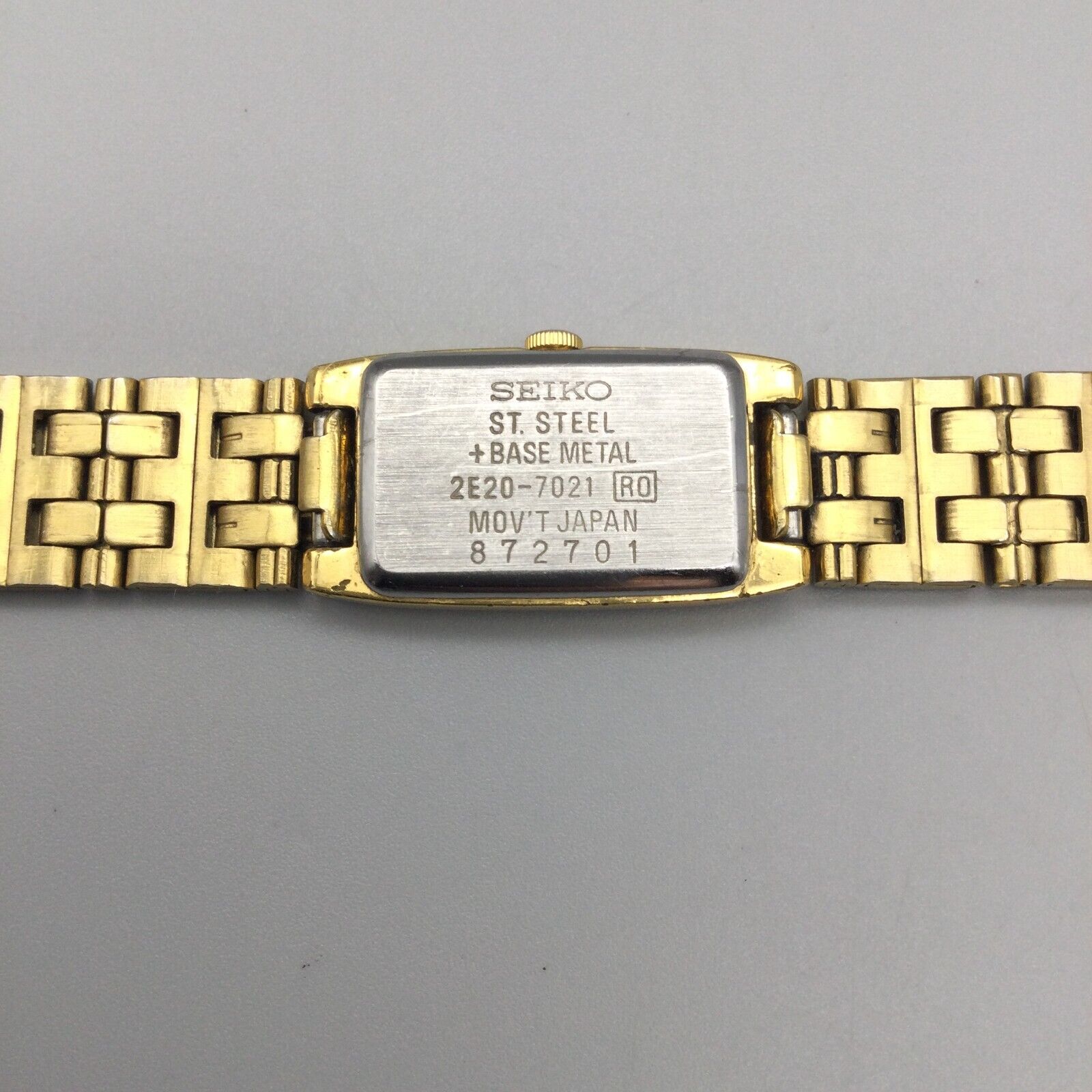 Vintage Seiko Watch Women 13mm Gold Tone Tank 2E20-7021