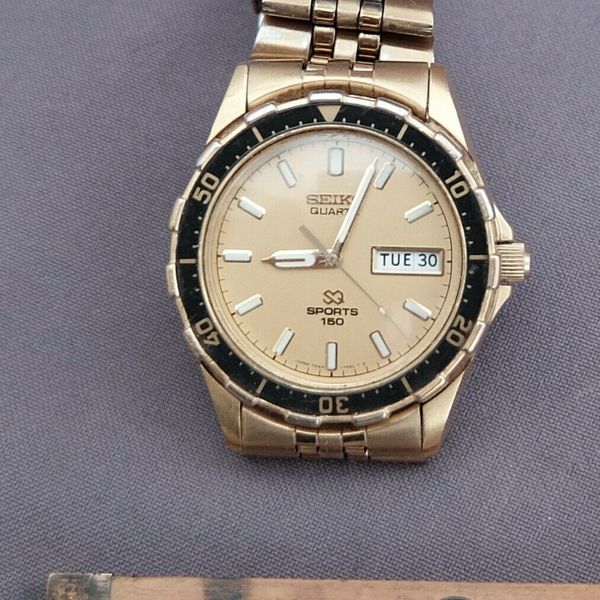 Seiko quartz Sports 150 7N43 7A49 gold colored dive style watch with