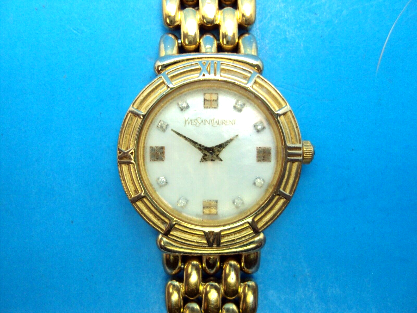 VTG YVES SAINT LAURENT QUARTZ WATCH--DIAMOND MOTHER OF PEARL