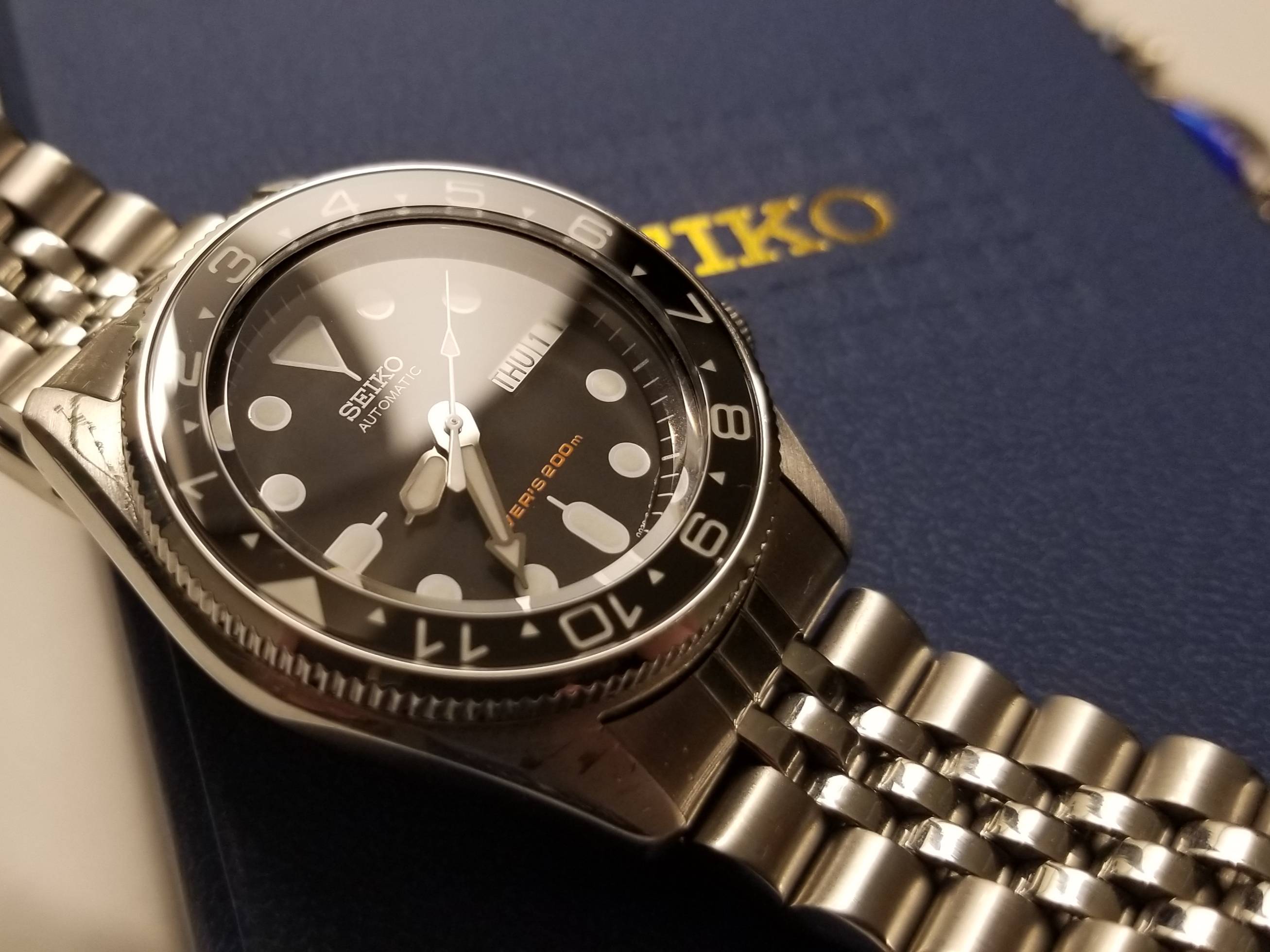 seiko skx013k2 black dial automatic divers midsize watch