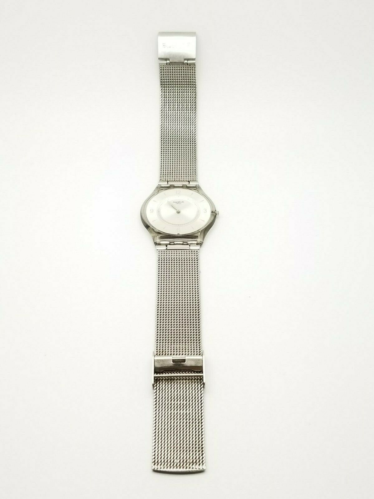 Swatch Metal Knit Quartz Resin Watch SFM118M | WatchCharts Marketplace
