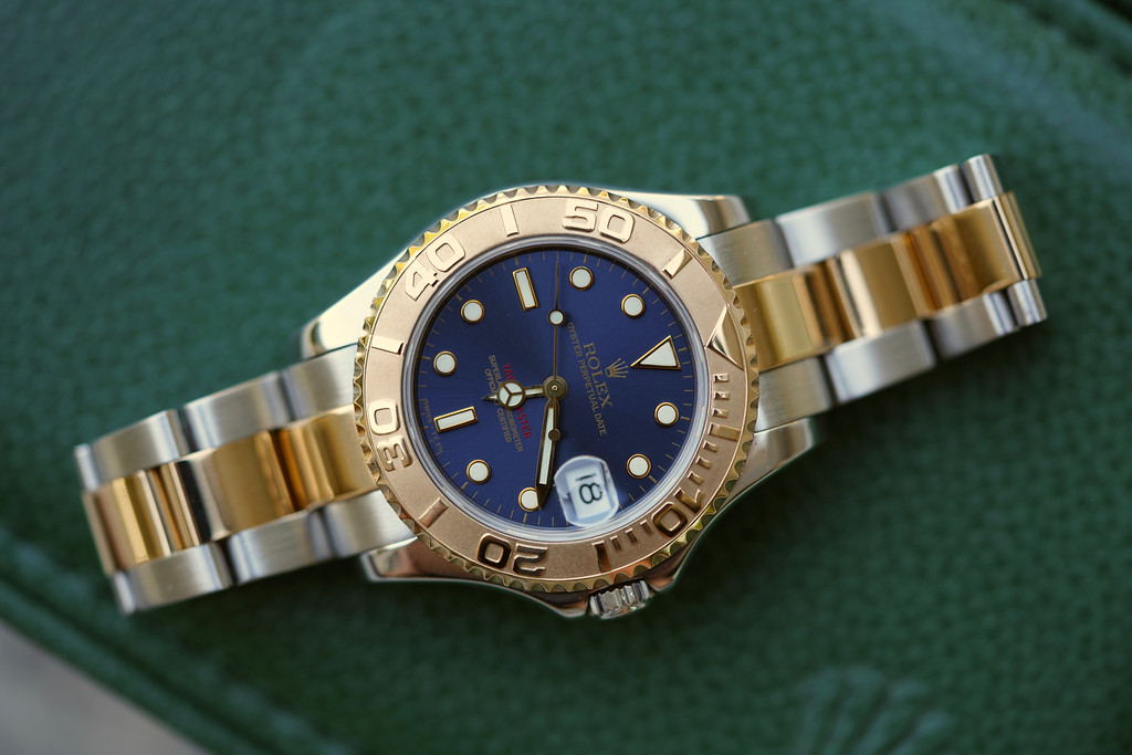 ROLEX YACHT-MASTER 35MM BLUE DIAL 18KT/SS - Gold & Ice Jewelry