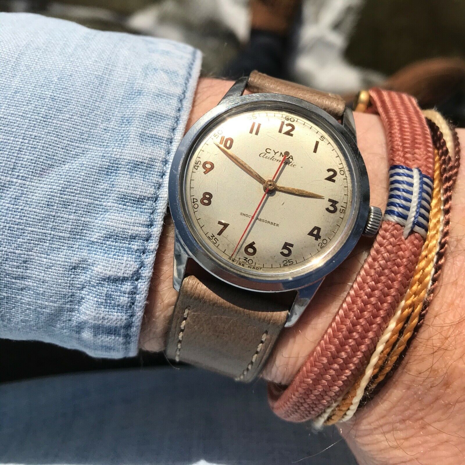 Stunning vintage 1940's Cyma automatic shock absorber gilt dial
