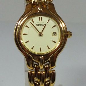 Seiko 7N89-0420 Gold Toned Ladies Quartz Watch Date Dial New battery |  WatchCharts