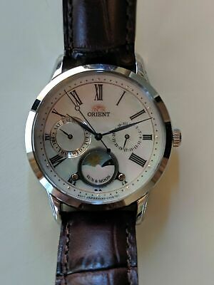 Orient petite sun discount and moon quartz watch