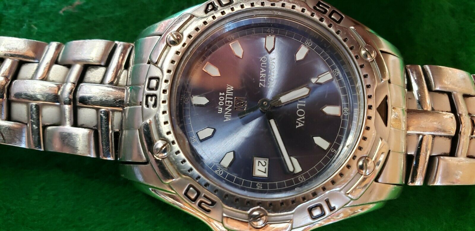 Bulova motion quartz millennia 100m hotsell