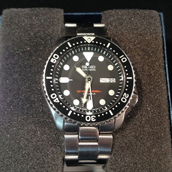 Seiko SKX007J Original Seiko Oyster with links, EXTRA Strapcode Oyster