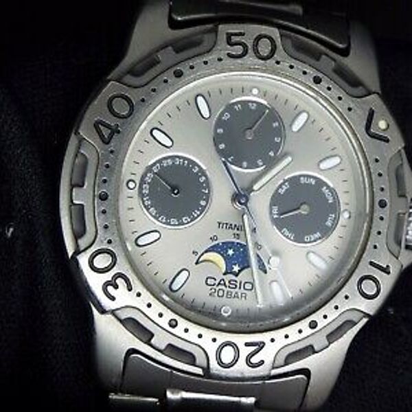 Rare CASIO VINTAGE NON DIGITAL WATCH MOONPHASE TITANIUM